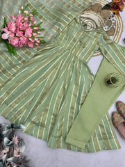 Soft pastel green mirror work suit flat lay showing open back dori tie-up
