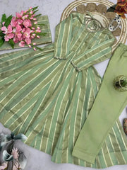 Full flat lay of soft pastel green mirror work suit set with dupatta, pants and footwear