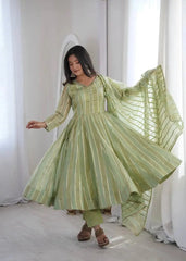 Soft pastel green mirror work suit dupatta draped over arm - side view