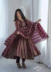 Close-up of mirror work embellished neckline on wine jacquard suit
