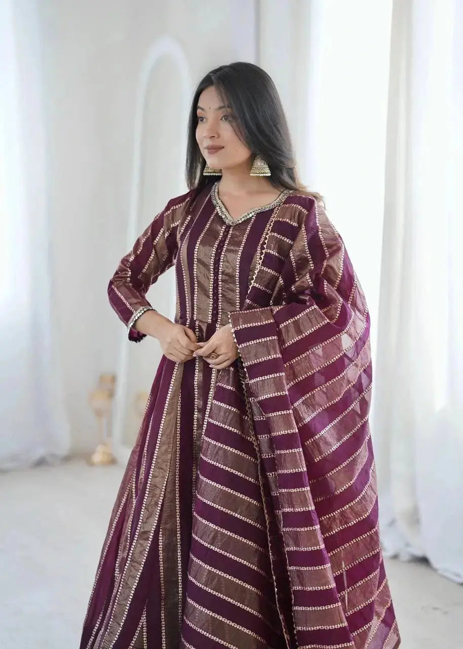 Wine mirror work suit dupatta draped over arm - side view