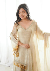 KU212 Beige Suit – Portrait with model looking down, close-up view of V-neck mirror work neckline and cold shoulder sleeves with dupatta