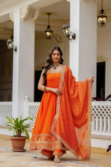 Orange Suit – gold zari temple border detail at hem
