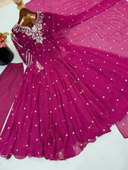 Magenta Embroidered Anarkali Suit – full-length walking pose showing flair movement