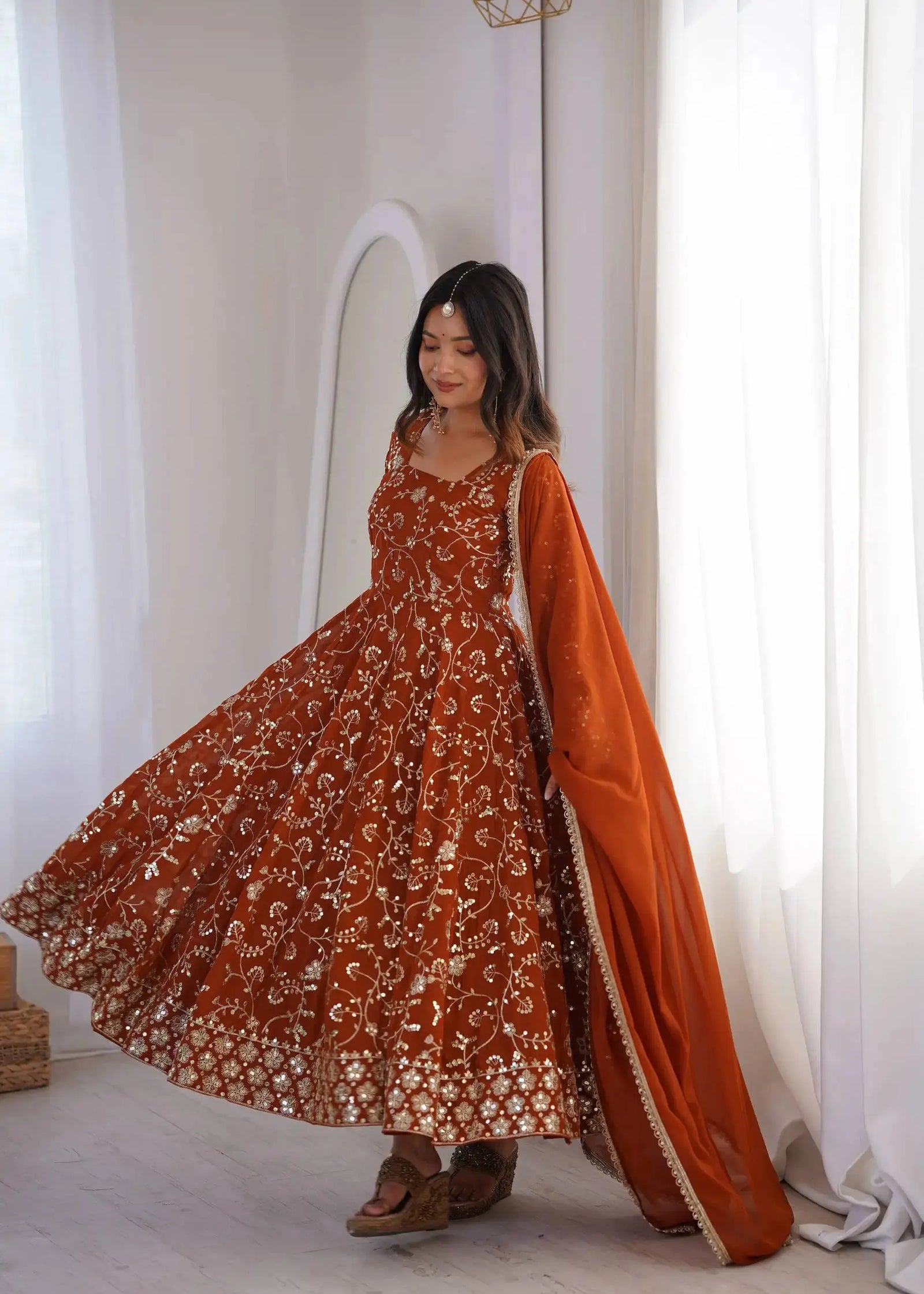 Orange All-Over Embroidered Suit – Model View with Full Flair | Kalyanja