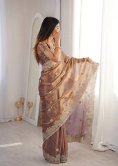 Lavender Pink Zari Embroidered Saree side view holding pallu near face