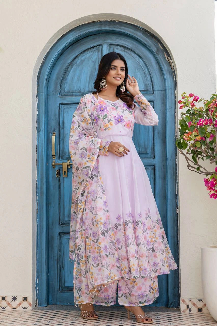Stylish light purple floral Anarkali outfit with embroidered yoke and coordinated floral dupatta.