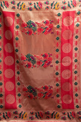 Traditional embroidered fabric with red and pink borders and central floral design.