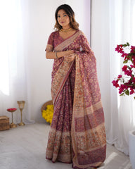 Woman wearing a traditional saree with a floral background