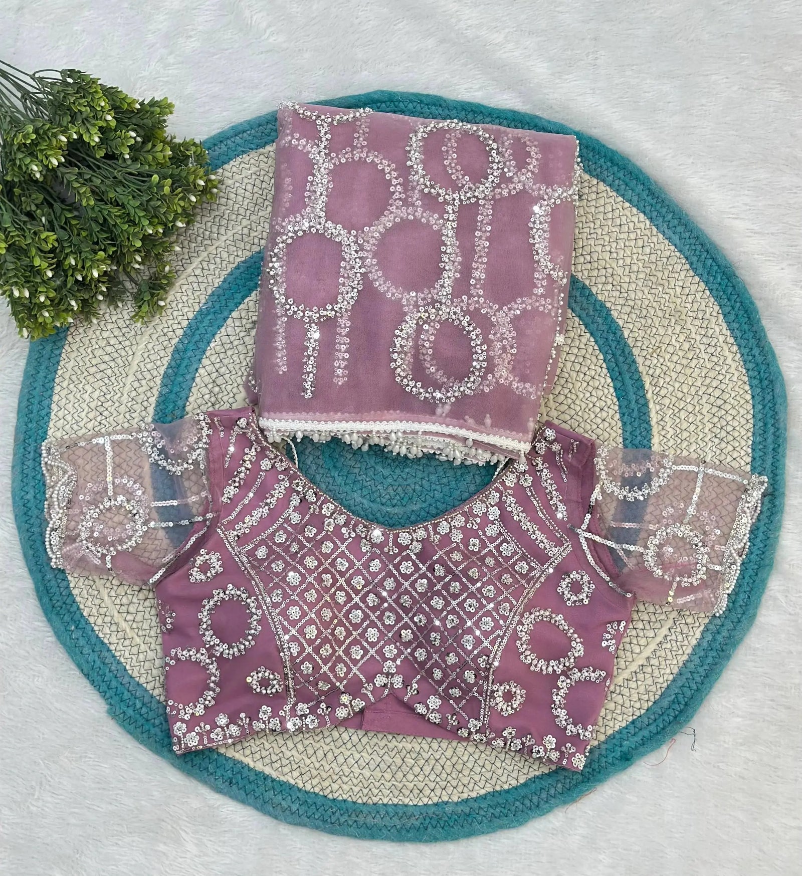 Gorgeous mauve pink sequins embroidered saree with matching blouse blends classic elegance, modern fashion, and festive charm.