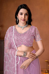Sophisticated embroidered saree with sparkling embellishments, elegant drape, and premium finishing for a refined ethnic look.