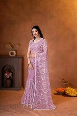 Premium party wear saree with a matching embroidered blouse, sheer embellished pallu, and luxurious ethnic styling.