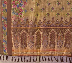 Light Brown Linen Saree flat lay showing contrast pallu with intricate paisley motifs and tassel fringe