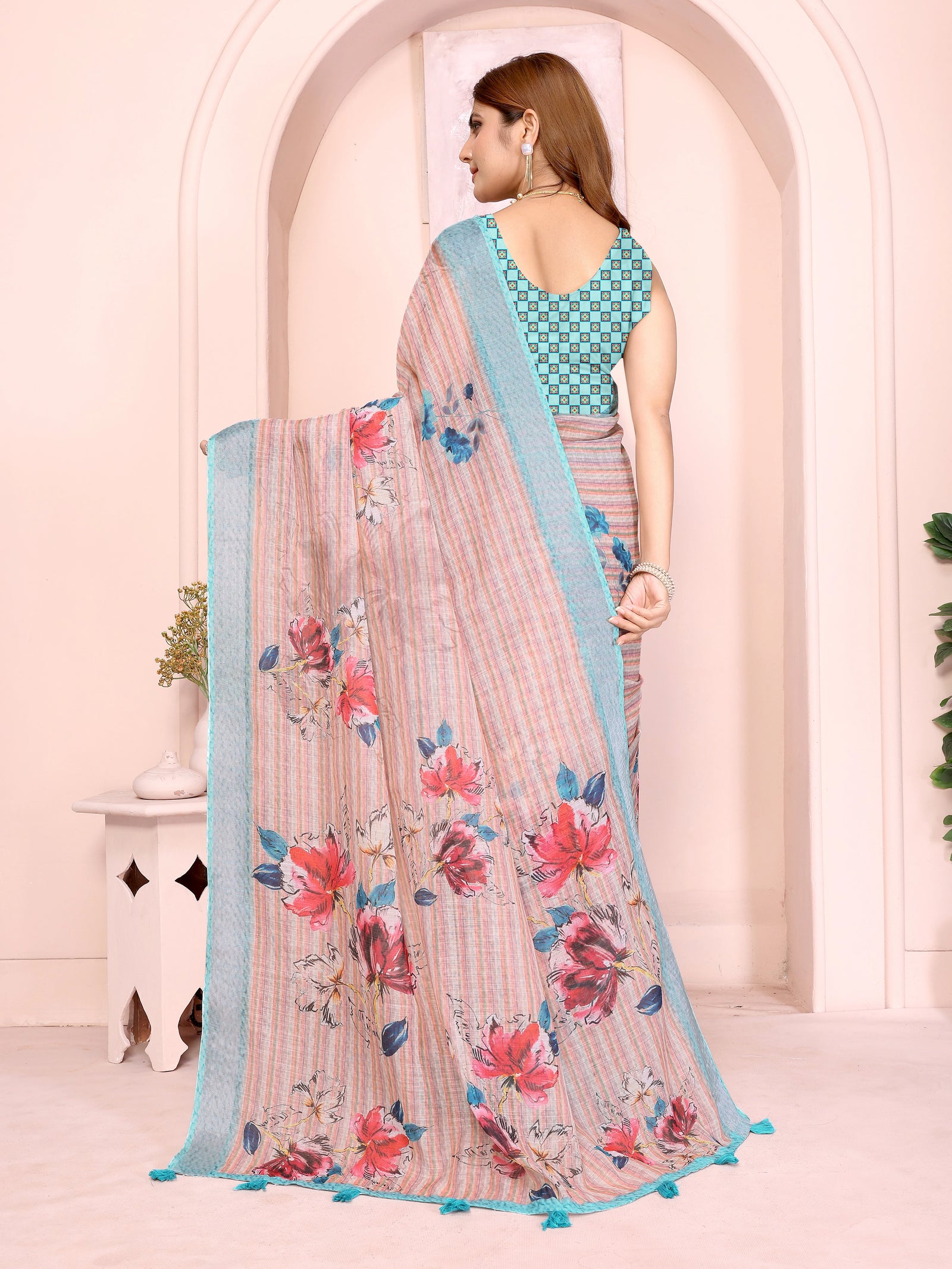 Light Peach Digital Floral Print Saree back view – printed pallu with contrast teal border spread full