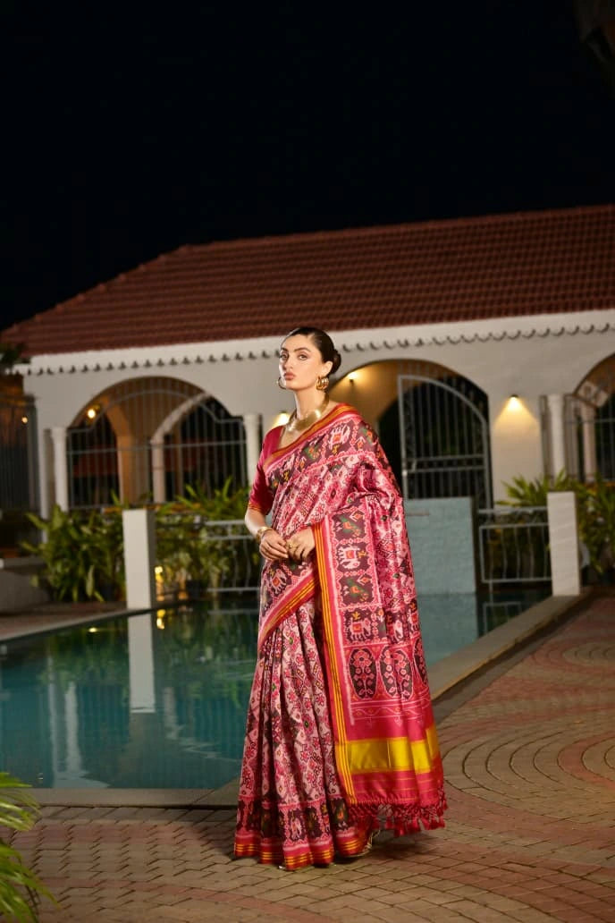 Light pink Patola silk saree with traditional Ikkat print displayed on Shopify product page