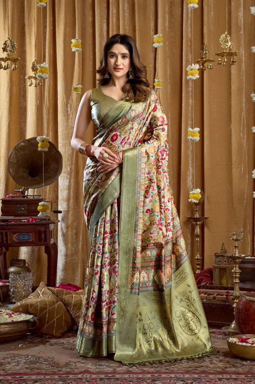 Woman in a floral saree standing in a decorated room with curtains and decorative items.