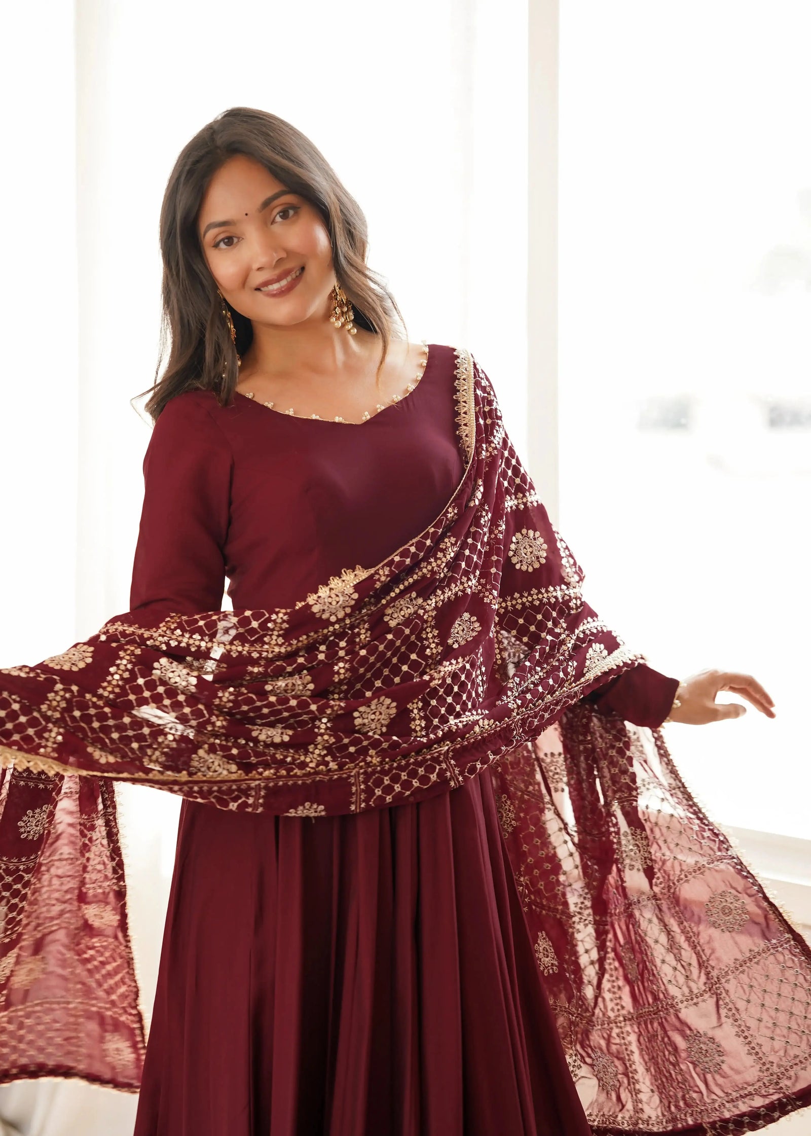 Close-up of sequins and zari embroidery dupatta on Maroon Anarkali Suit