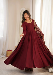 Maroon Sequins Embroidered Anarkali Suit model twirling showing full flare