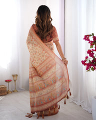 Woman wearing a traditional saree with a floral background