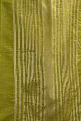 Green fabric with white vertical stripes