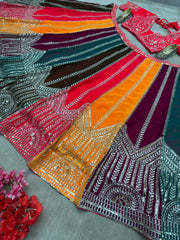 Close-up of multicolor lehenga border with intricate arch motif zari and sequins embroidery