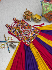 Colorful traditional outfit with intricate patterns on a textured surface