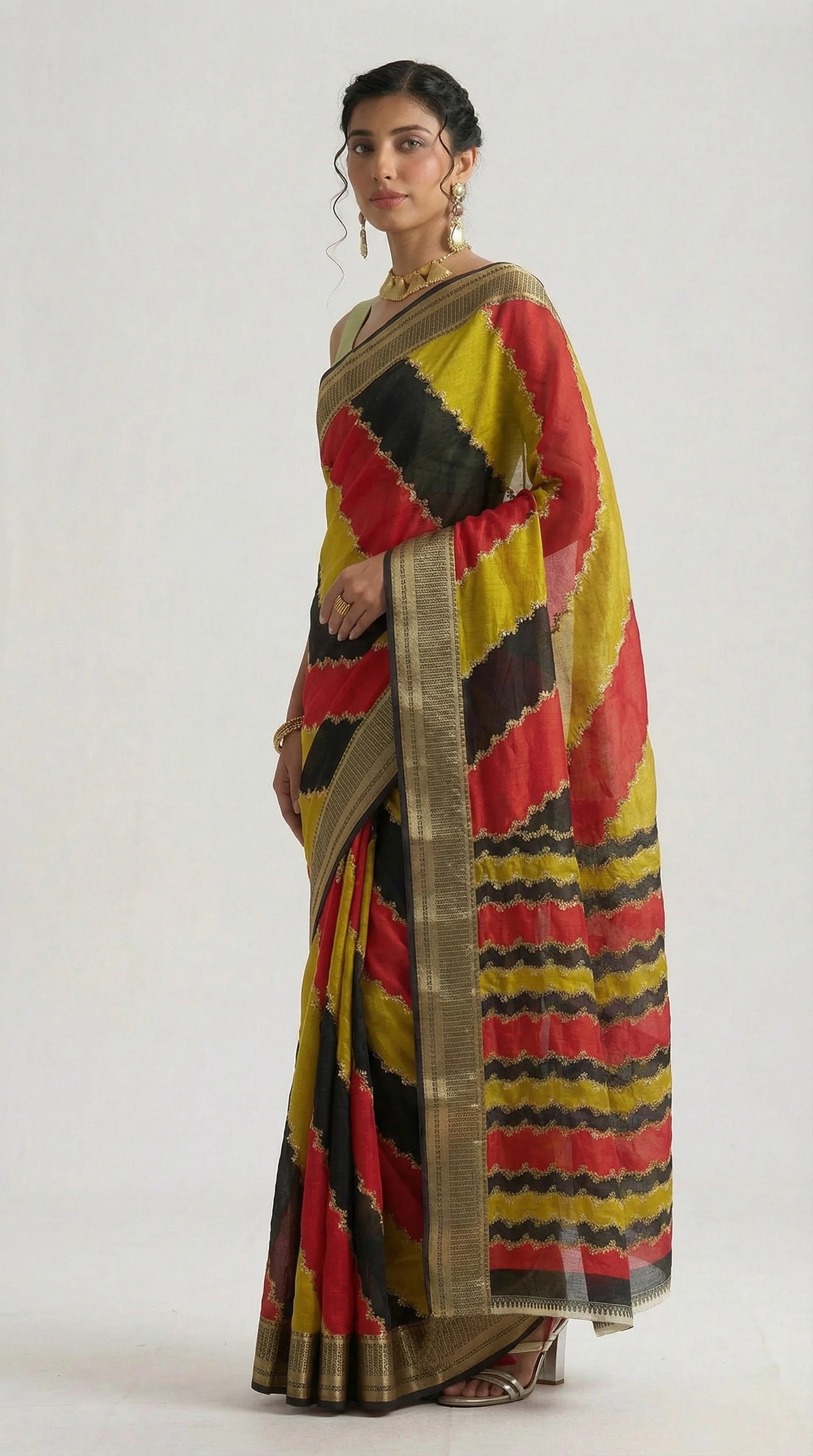 Woman wearing a colorful saree with a white background