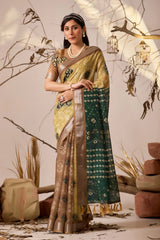 Woman in a traditional saree with a decorative background
