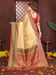 Handcrafted pure Banarasi tissue silk saree in mustard yellow shade featuring elegant zari patterns.