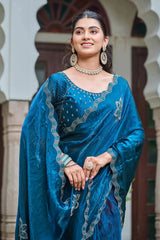 Close-up of Navy Blue Diamond Work Saree blouse and pallu with teal stone contrast border