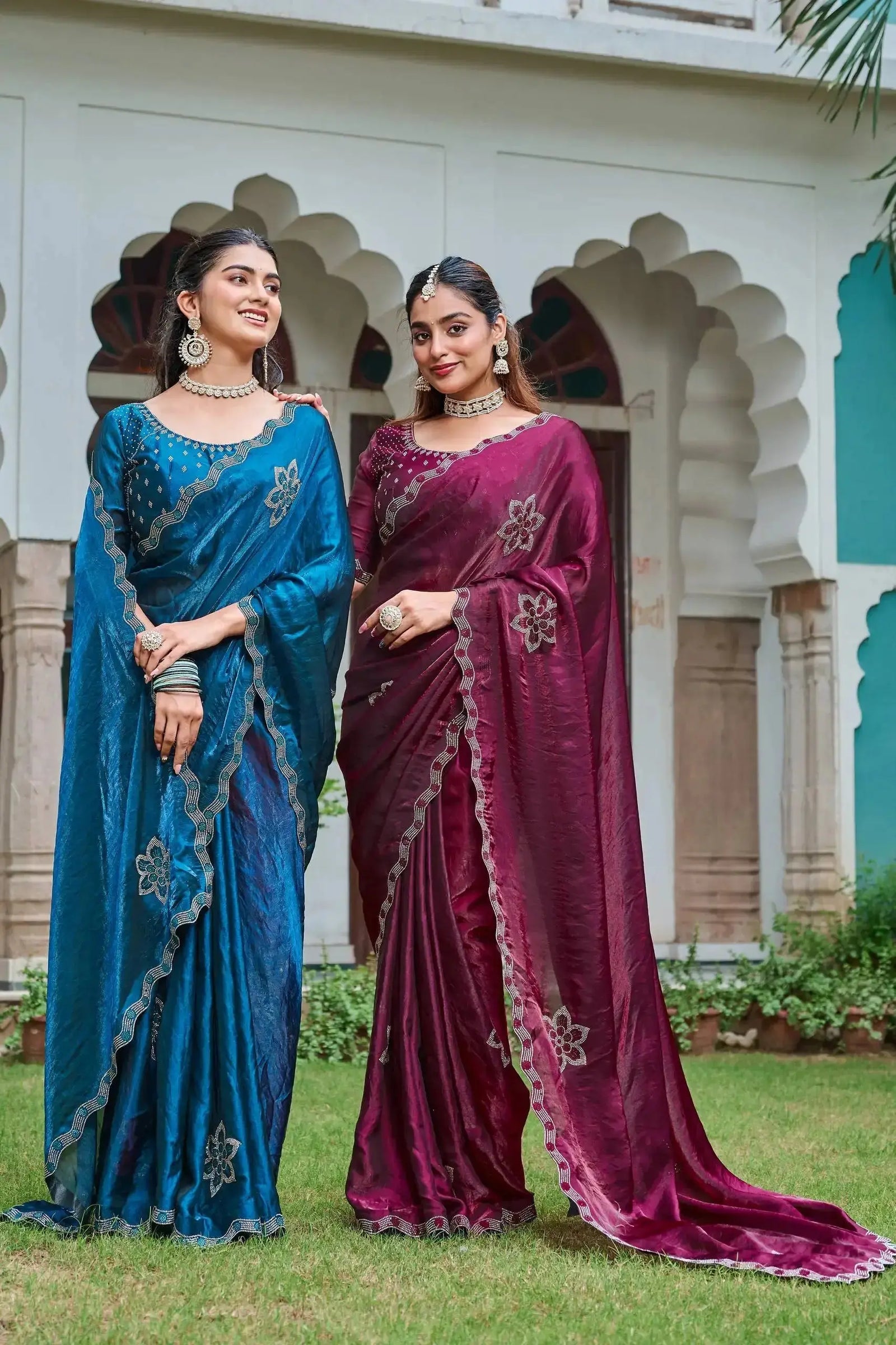 Navy Blue and Maroon Diamond Work Sarees styled together, outdoor shot