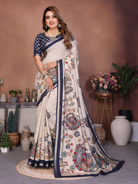 Woman wearing a traditional saree with a decorative border in a home setting.