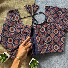 Displayed on woven jute and gray cloth.