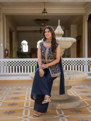 Navy blue georgette suit showcasing heavy embroidery craftsmanship.