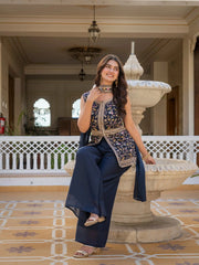 Close-up of neckline embroidery on navy blue georgette suit.