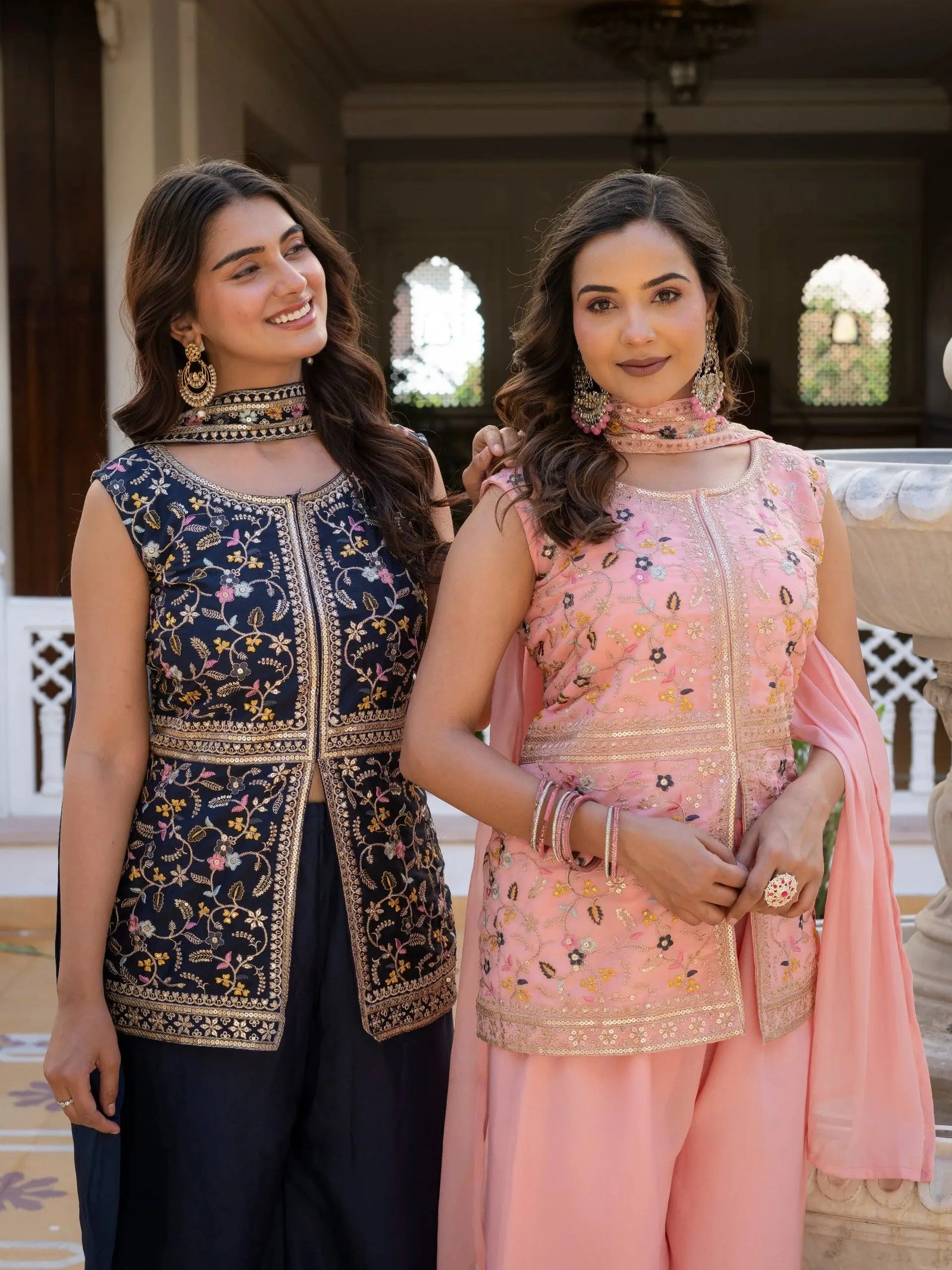Full view of navy blue embroidered georgette suit with dupatta.