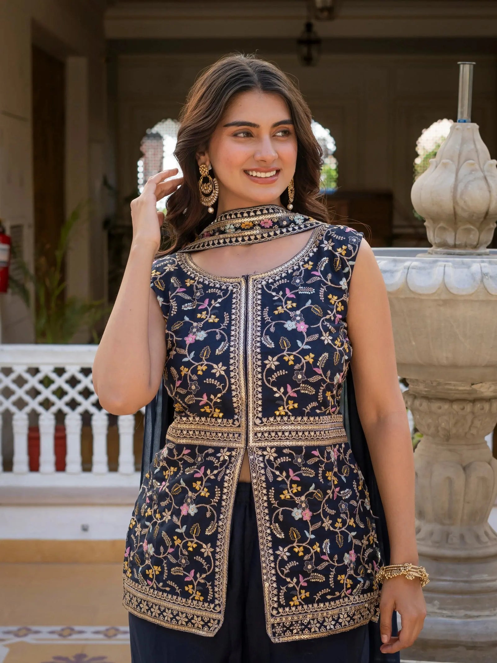 Navy blue georgette suit featuring star embroidery patterns.