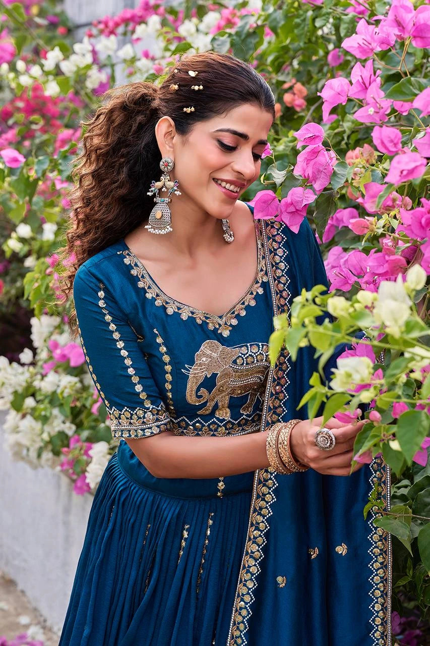 Traditional navy blue embroidered lehenga with ornate sequins and moti detailing.