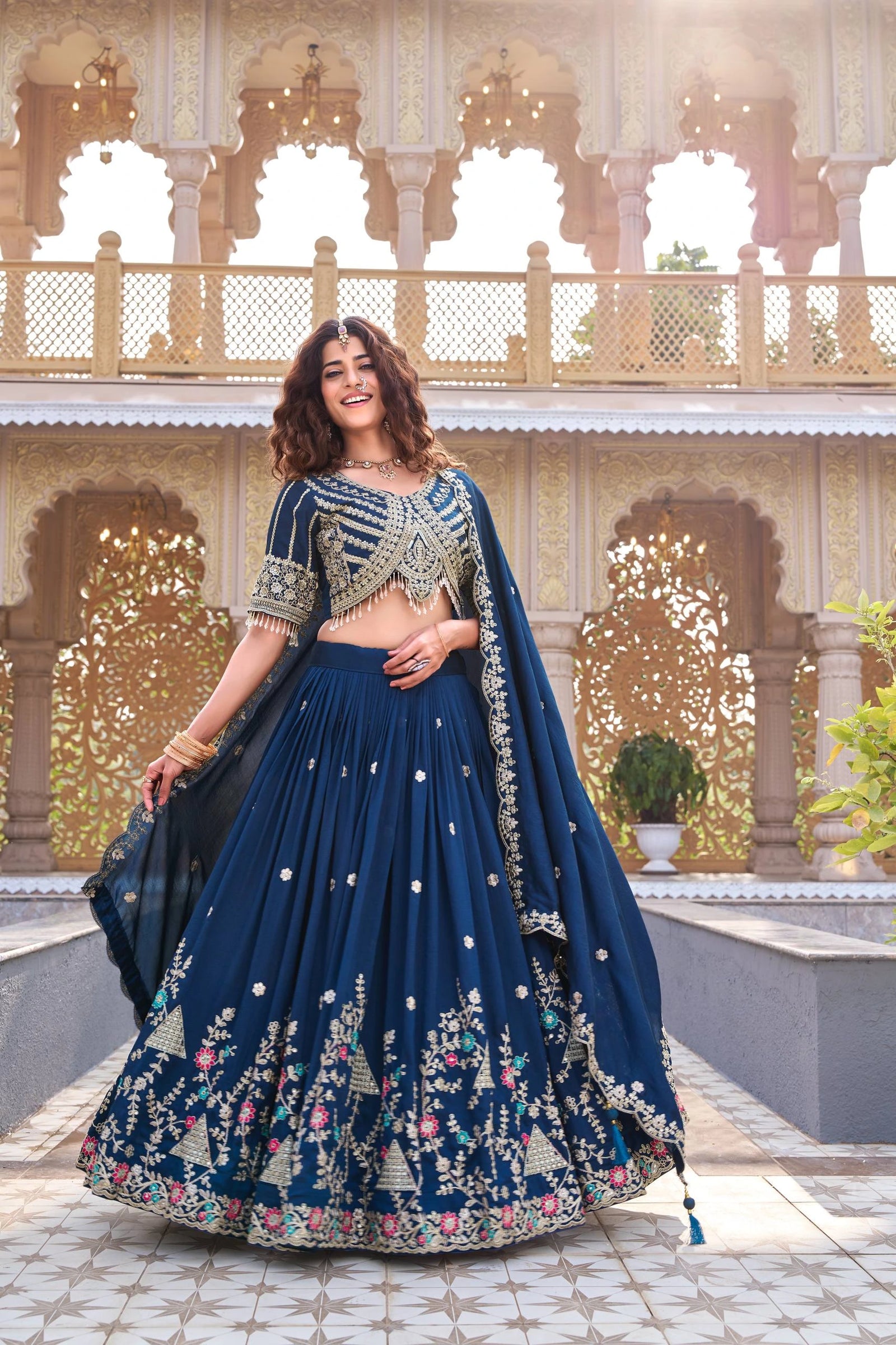 Navy blue Vichitra lehenga with sequins and thread embroidery displayed on Shopify product page