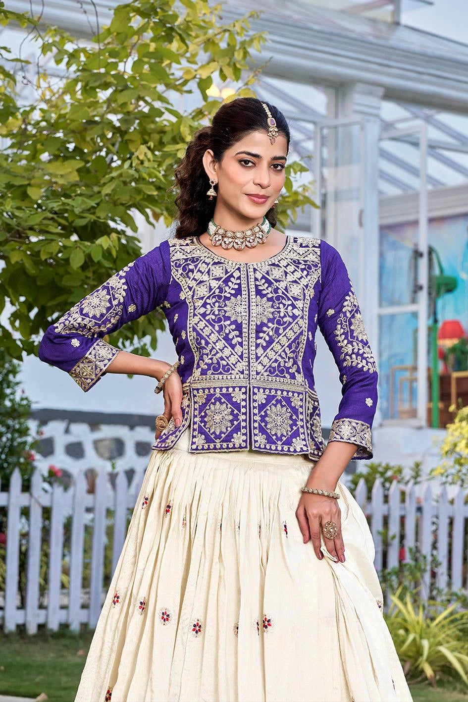 Elegant ethnic outfit featuring a sequins embroidered tissue silk kurti and flared lehenga with 3.5 meter flair and soft micro cotton inner.