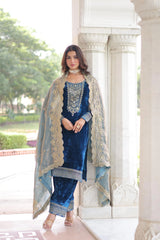Woman in a blue traditional outfit with a white background