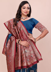 Teal blue Avni silk saree featuring intricate copper-toned zari weaving and a rich maroon pallu by Kalyanja.