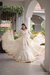 Traditional Off White Lehenga Outfit with Peplum Kurti, Broad Ghera, and Classic Golden Lace Work