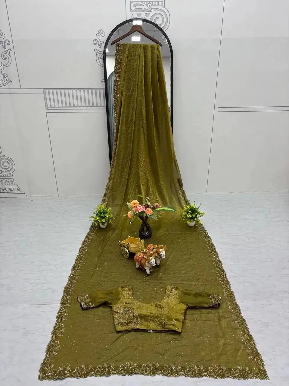 Olive Green Diamond Work Saree flat lay with matching blouse piece