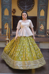 Woman wearing a traditional outfit with a white top and green skirt in an ornate setting.