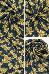 Navy blue fabric with gold floral pattern, shown in four different folds.