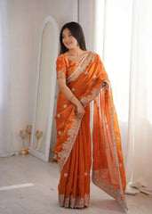 Orange Zari Embroidered Saree portrait looking away