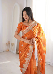 Orange Zari Embroidered Saree portrait looking down