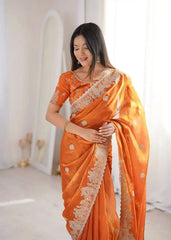 Orange Zari Embroidered Saree portrait looking down