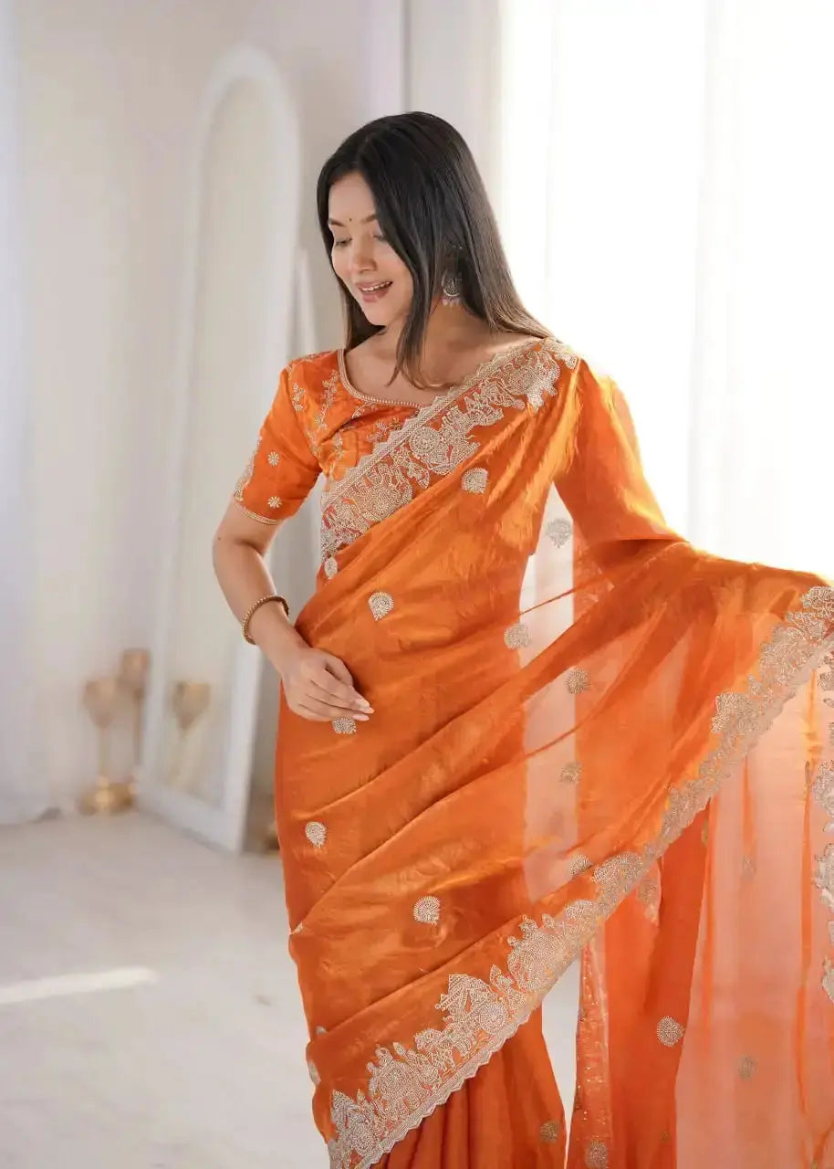 Orange Zari Embroidered Saree portrait leaning view